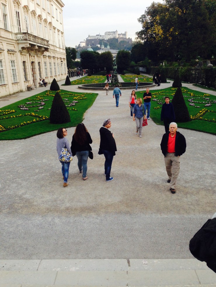 View of the gardens and the old Salzburg fortress in the background from the stairs.