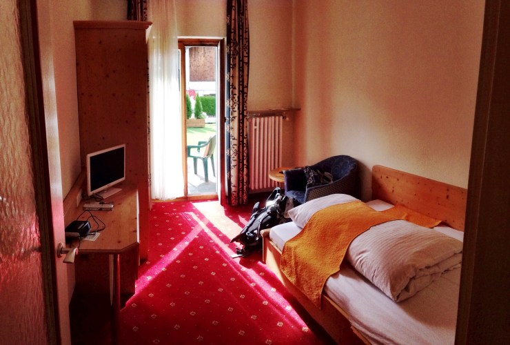 My adorable little hotel room. It was so nice to be have some space to myself. Through the door is a little porch area with chairs. Perfect for reading and wine.